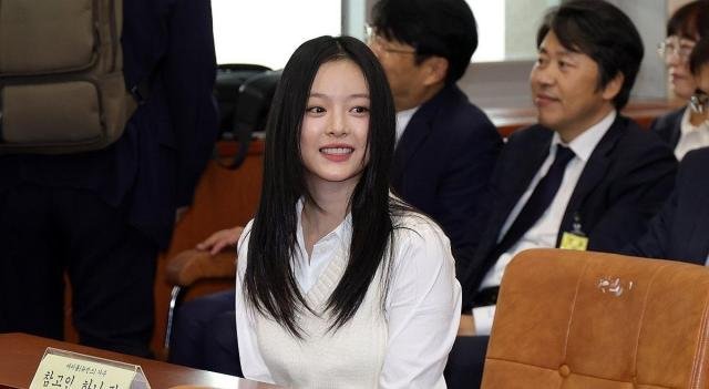 Hanni a member of girl band NewJeans appears at a parliamentary audit held at National Assembly in Yeouido Seoul on Oct 15 2024 Yonhap